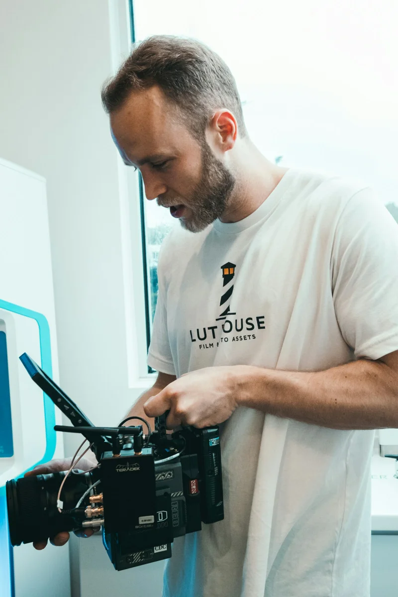 Professional adjusting a cinema camera