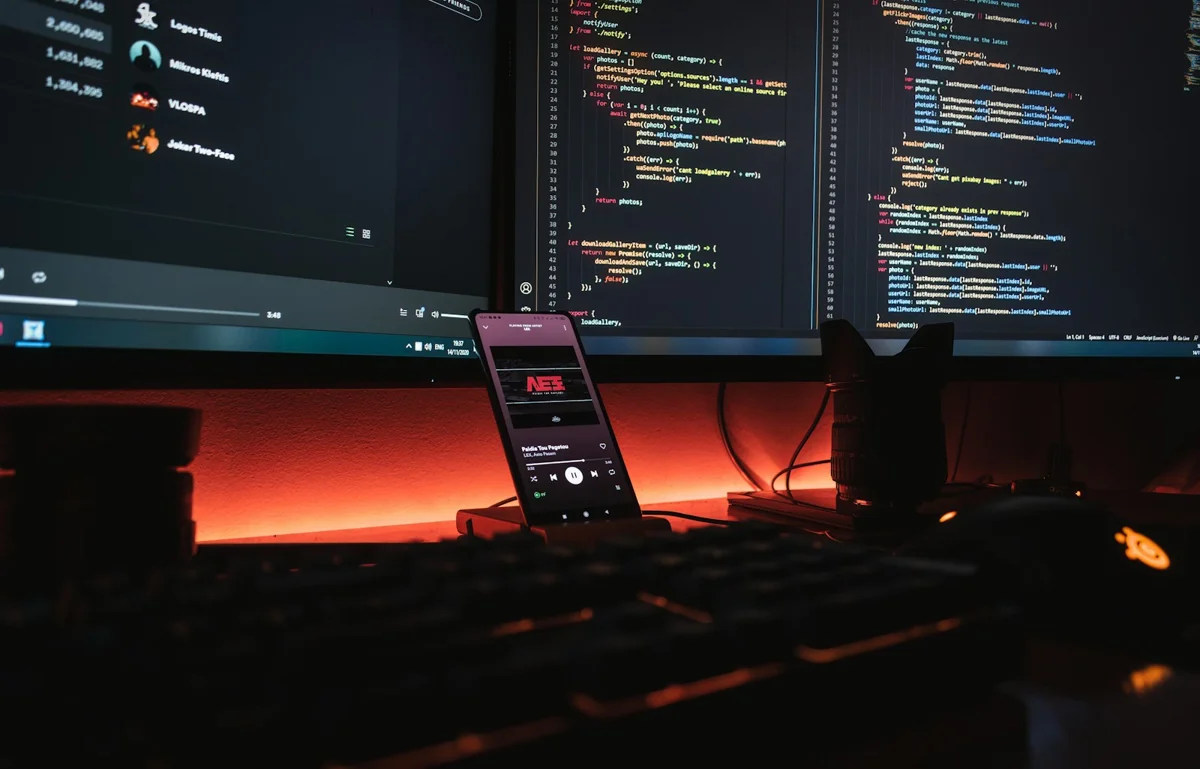 Screens showing code in a developer workspace